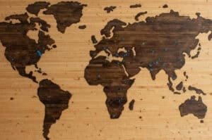 A pinboard with a map of the world.